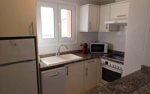 Oliva Nova flat in front of MET