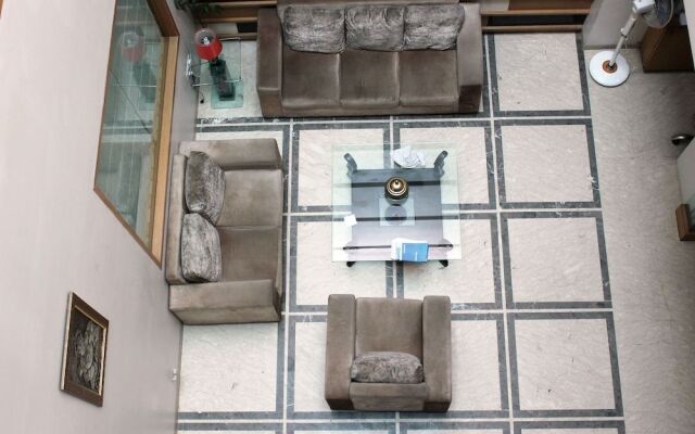Capital O 419 Hotel JPS Residency