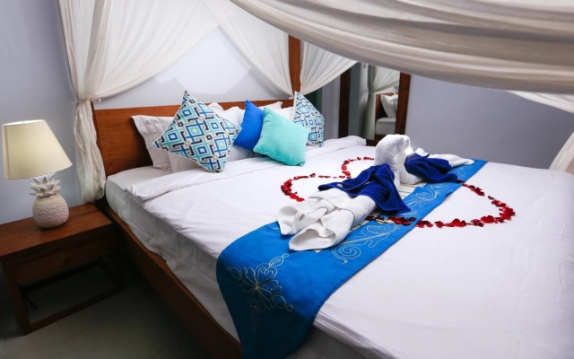Tiga Kelapa Villa – Guest Rooms – Kuta