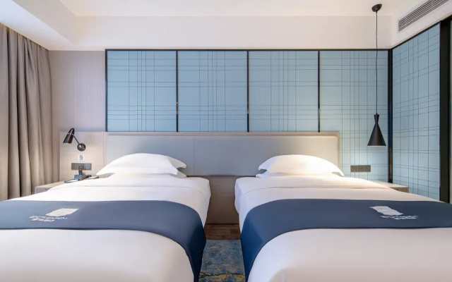Echarm Hotel (Hechi Yizhou Municipal Center Plaza)