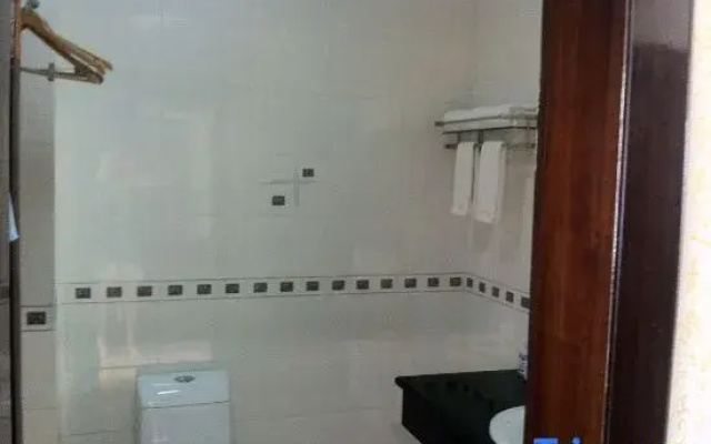 Mengzi Baxianlin Business Hotel (Jiqing Road)