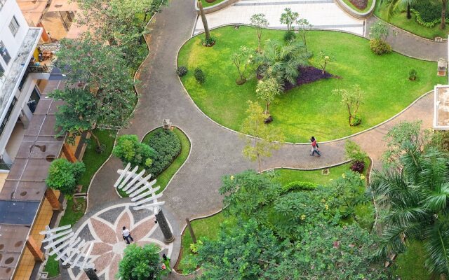 Monochrome Style 2 Bedrooms at Kalibata City Apartment By Travelio