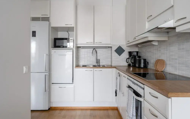 Top Floor 1BR Home with Parking, Sauna and Balcony