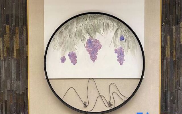 Jianguo Puyin Hotel (Qingdao Wusi Square Qingdao University Branch)