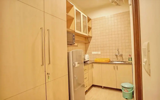 Enkay Suites - DLF CyberCity