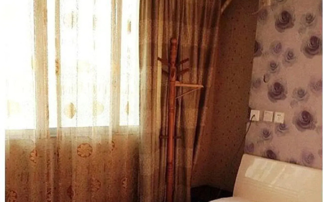 Beichuan Yijia Business Inn