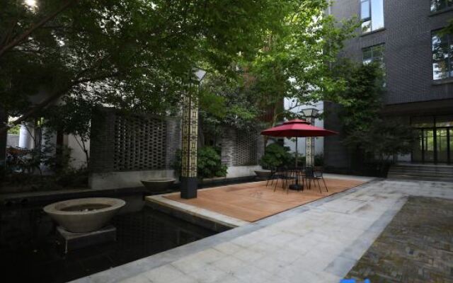 Xinyang Nanwan Lake Camellia Hotel