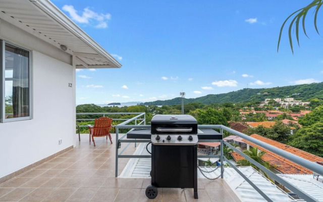 Modern Top-Floor Condo with Panoramic Views and Community Pool