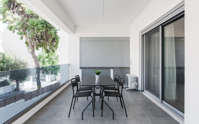Teal Faliro House by UPSTREET