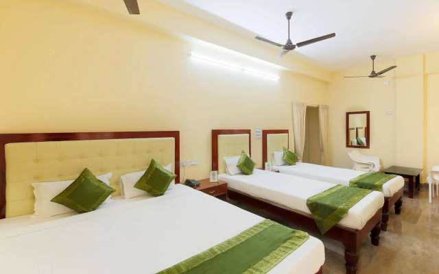 Treebo Grace Inn, 3 Min Walk From Promenade Beach