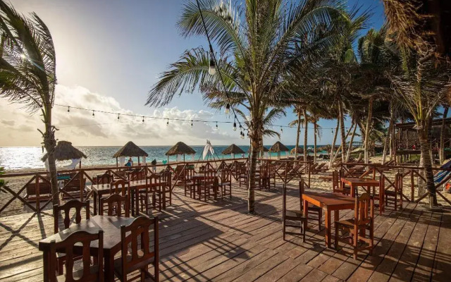 Capital O Hotel Arena Beach Club