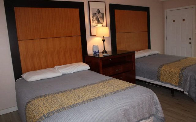 Apm Inn & Suites