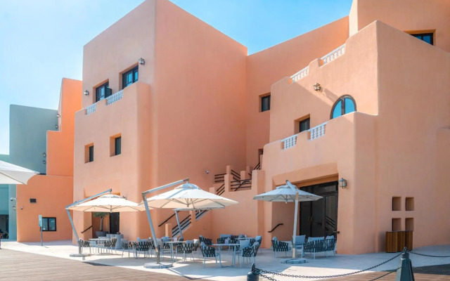 Mina Hotel and Residences By the Torch