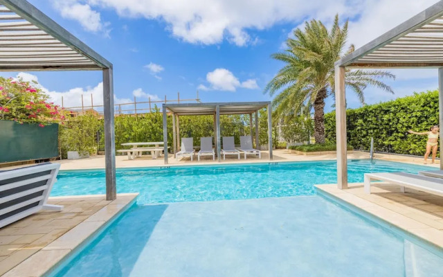 Serene Designer Gem Walk to Beach Strip Pool