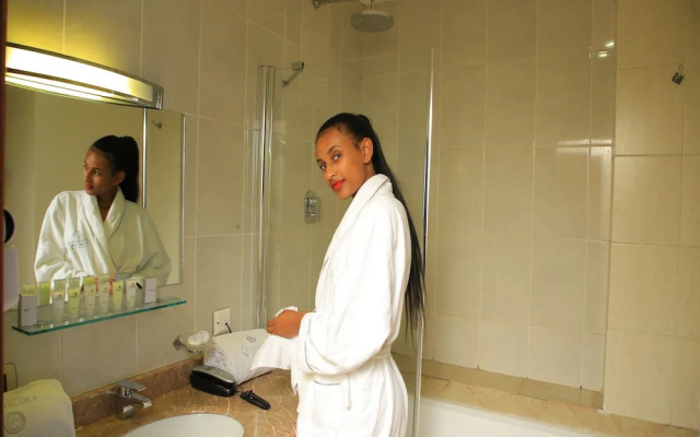 Kenenisa.. Oasis International Hotel