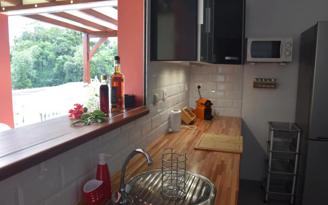 Haut de villa dans son écrin de verdure