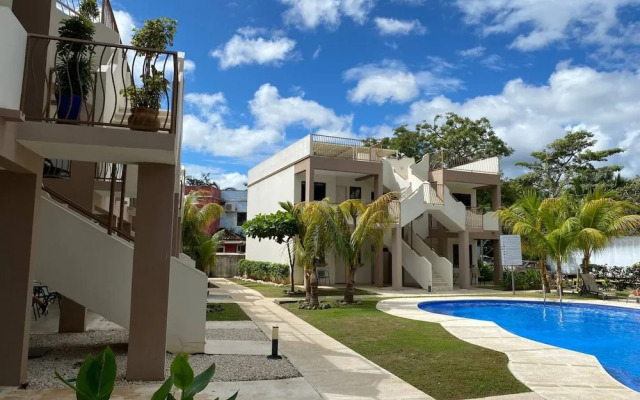 Cozy Condo with Panoramic Hillside Views from Rooftop Terrace and Short Walk to Beach