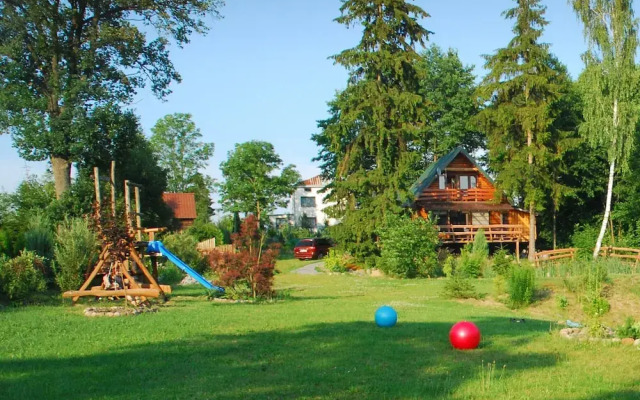 Rustic Riverside Cabin in Forest