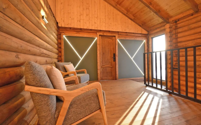 Wooden Villa with pool and sauna