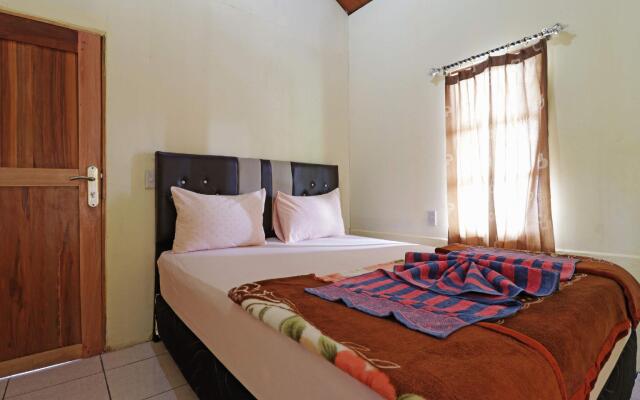 Tuk Tuk Timbul Bungalows
