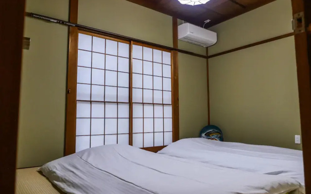 Tomarigi House