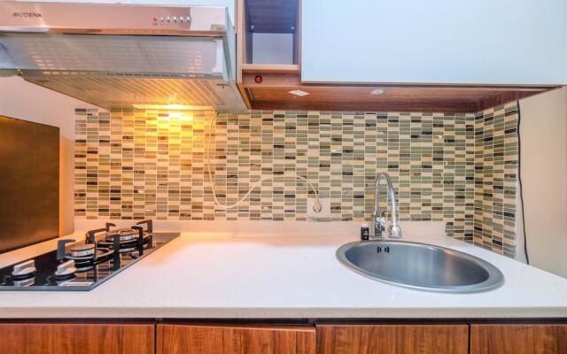 Comfort And Cozy Living Studio Room At Tifolia Apartment