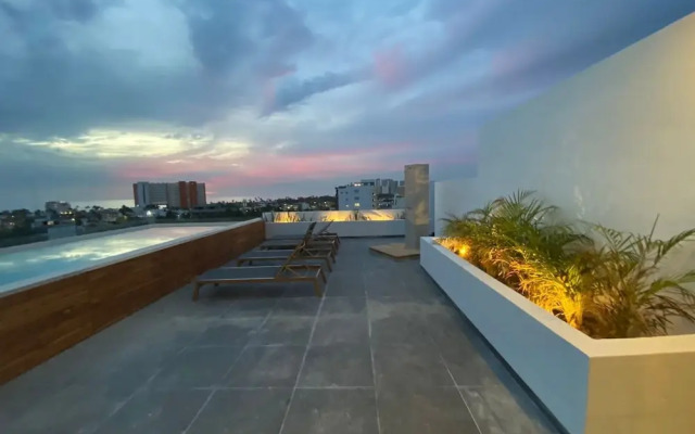 Serene Stylish Stay Roof Pool and Lounge