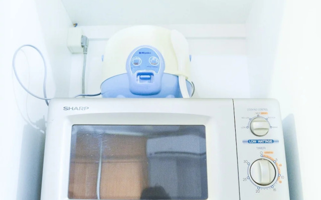 Simple Studio with Balcony at Gardenia Boulevard Apartment