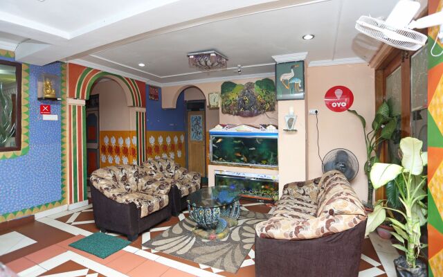 Capital O 6077 Hotel Ashraya