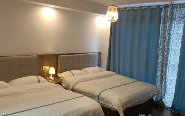 Huaxi Wanjia Homestay