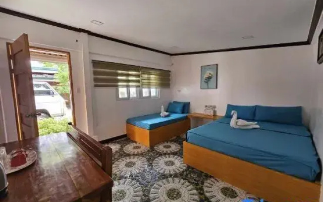 Tambayan Rooms & Cottages by SMS Hospitality