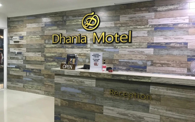 Dhania M
