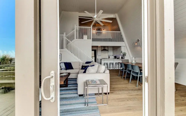 Roomy Chalet-Style Beachfront Condo with Private Beach Access by RedAwning