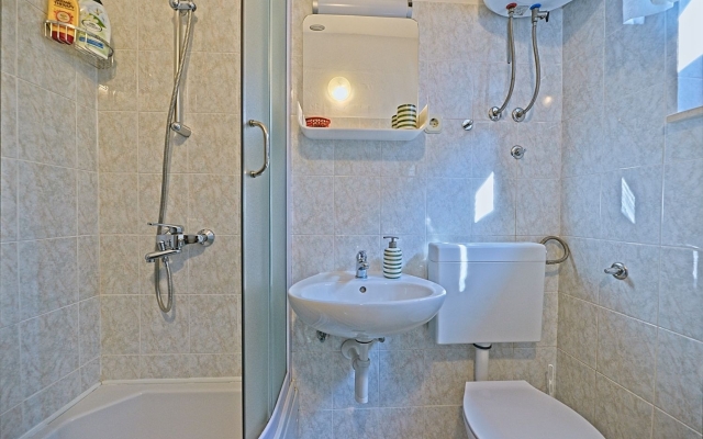 Holiday house Viki - sea view terrace: Postira, Island Brac