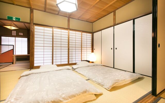 Nishinokyouharamachino Ie