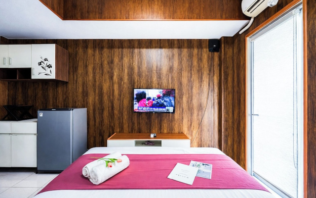 Wood Accents Studio At Tamansari Prospero Sidoarjo Apartment