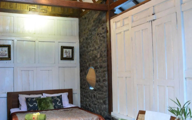 The Riverside Javanese Cottages