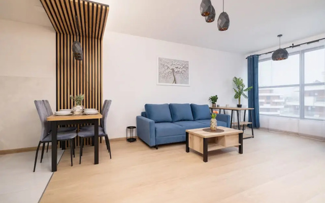Dark Blue Apartment in Kraków by Renters