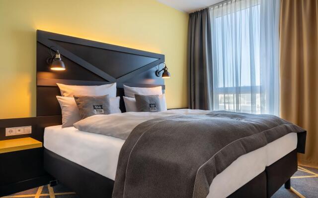 Holiday Inn - the niu, Fury Aschheim Messe by IHG