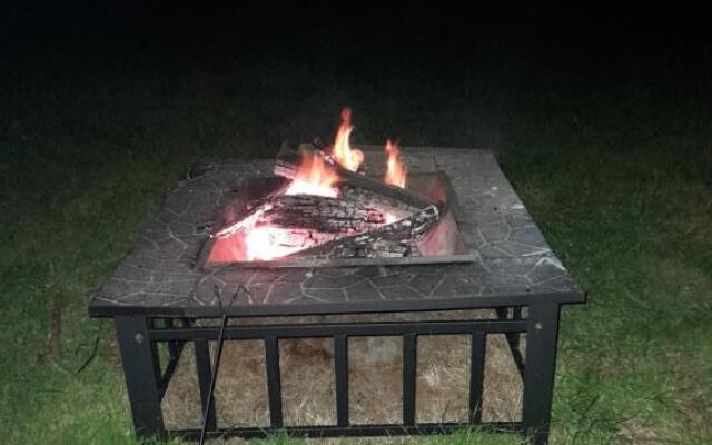 Log cabin retreat and luxury bell tent