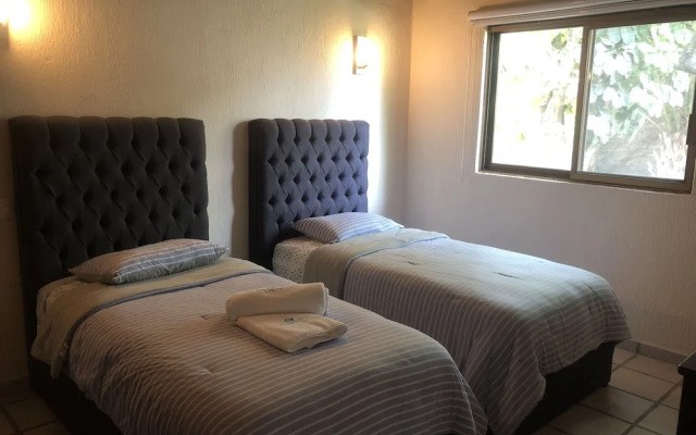 El Jardín De En Medio