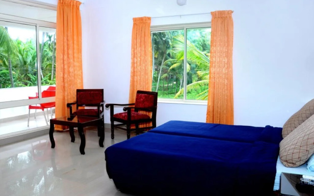 Vedanta Wake up! by Lighthouse Beach, Kovalam