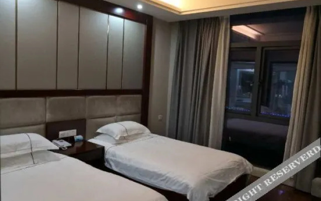 Yuexi Jincuilan Business Hotel