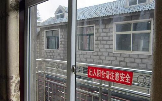 Xinyang Jigong Mountain Wenchenju Inn