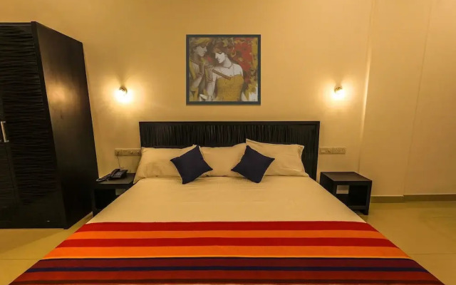 Capital O 491 Golden Peir City Hotel