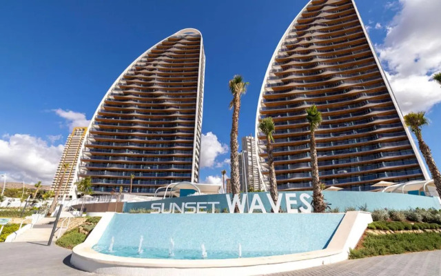 SUNSET WAVES vistas al mar