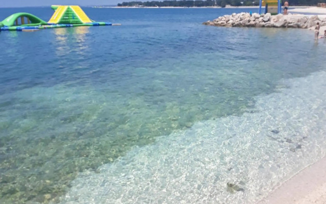 Family friendly apartments with a swimming pool Pula - 7610