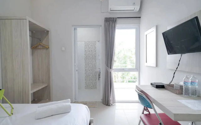 Urbanview Hotel Bari Syariah Palembang By RedDoorz