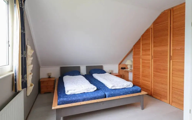 Nice Holiday Home on the Water in Friesland