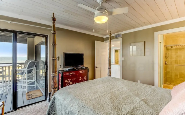Newly Remodeled Oceanfront Condo with Salt Water Pool and Private Walkway to Beach by RedAwning